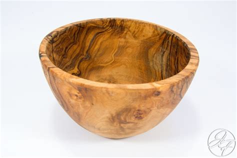 Produkty z olivového dreva a likér Kumquat