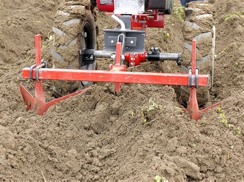 Hrobkovacia radlica pri práci