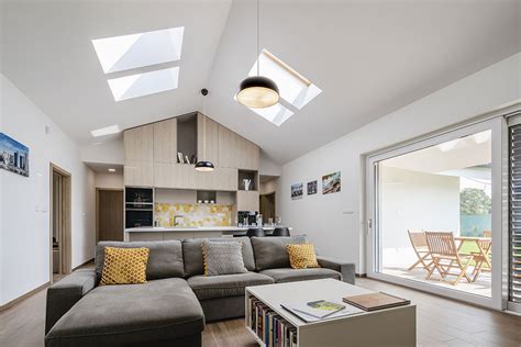 Vizualizácia interiéru s optimálnym využitím denného svetla vďaka strešným oknám