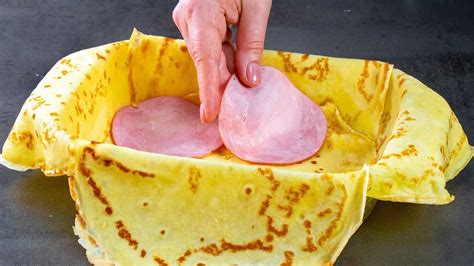 Ilustrácia plnených palaciniek so šunkou a syrom